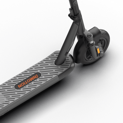 Close-up of INMOTION S1F electric scooter deck and rear wheel design.